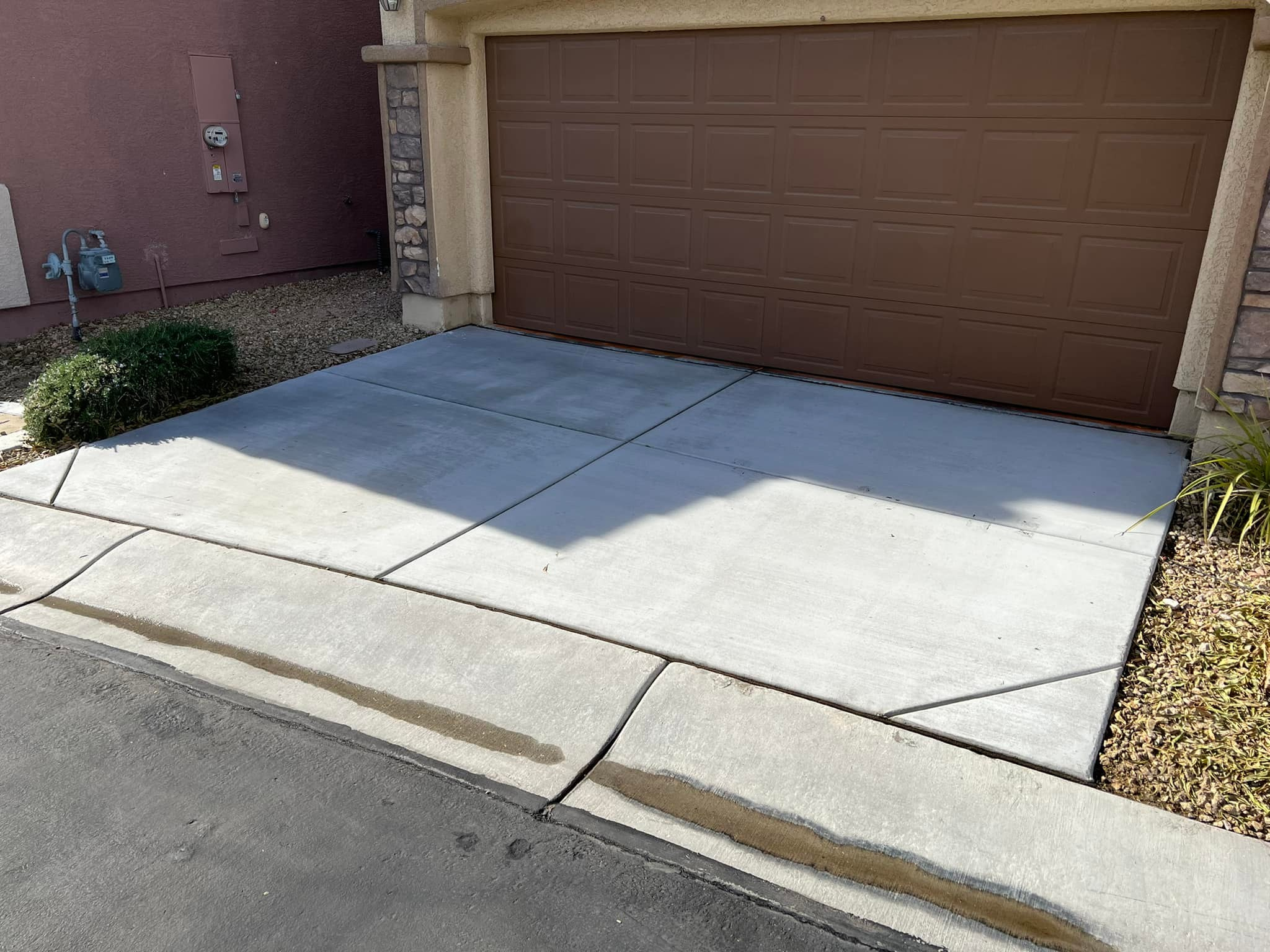 Restored residential concrete driveway