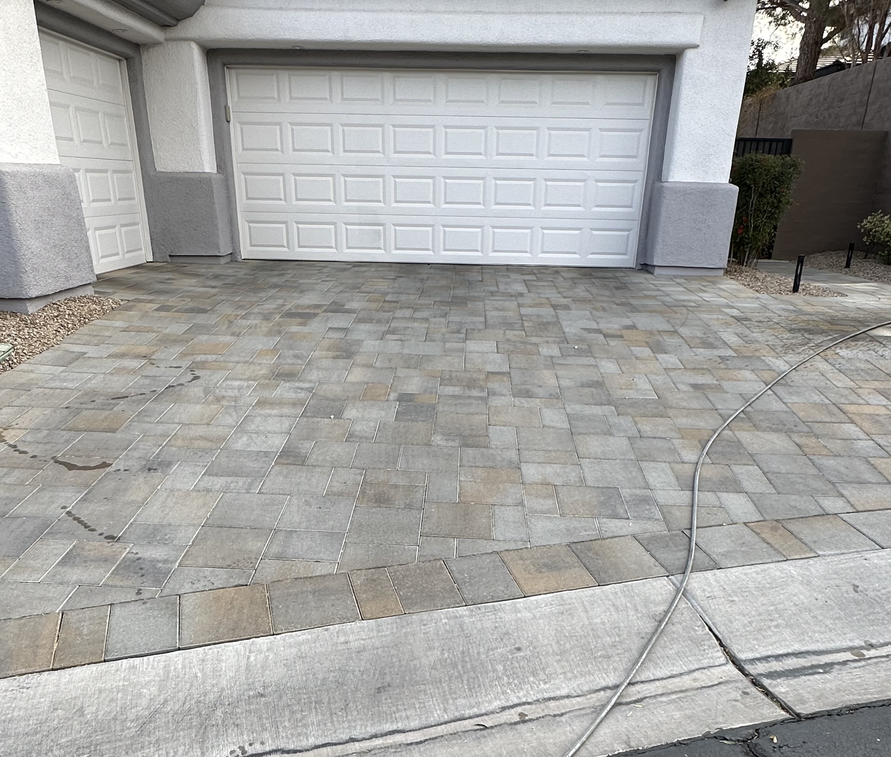Paver driveway before restoration